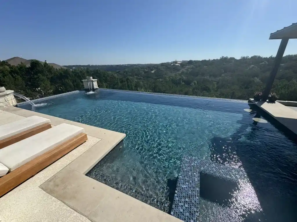 Crystal clear swimming pool in Austin treated with Orenda methods